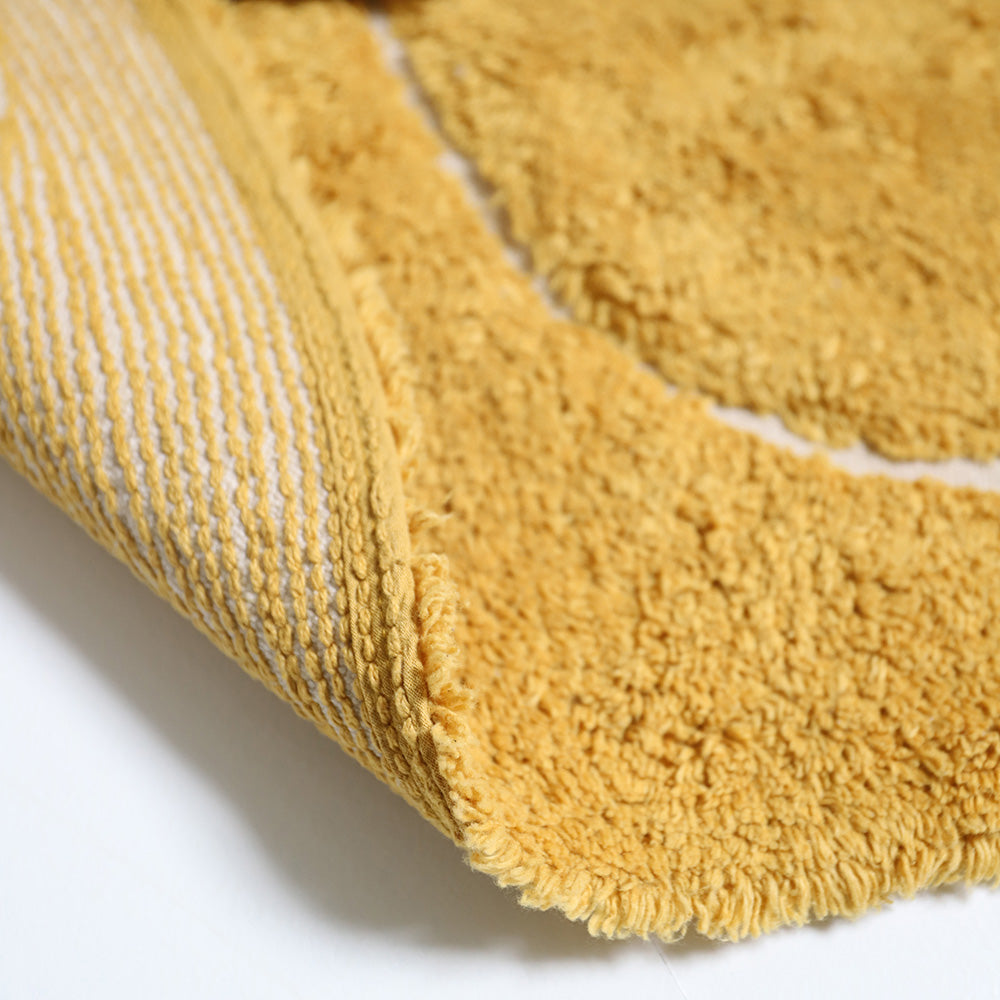 YVA Mangue tapis enfant bohème avec pompons nattiot-shop