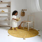 YVA Mangue tapis enfant bohème avec pompons nattiot-shop