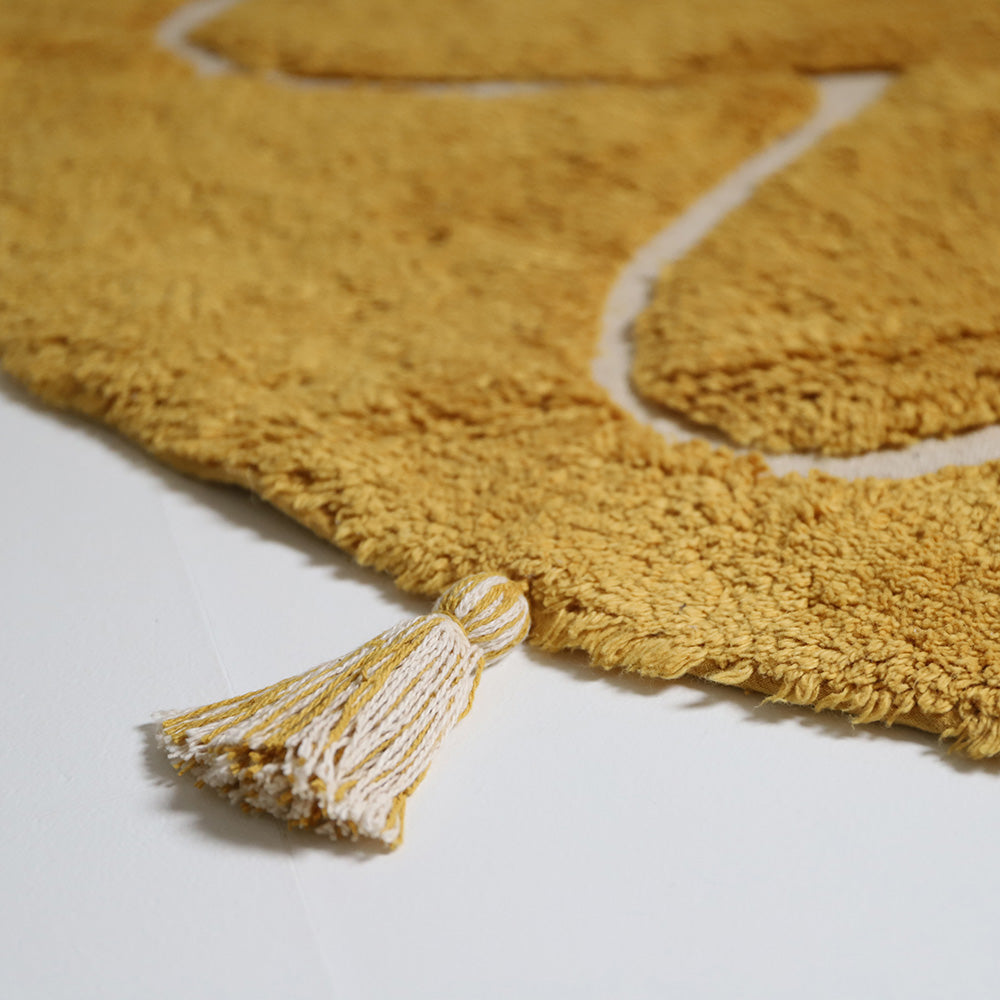 YVA Mangue tapis enfant bohème avec pompons nattiot-shop