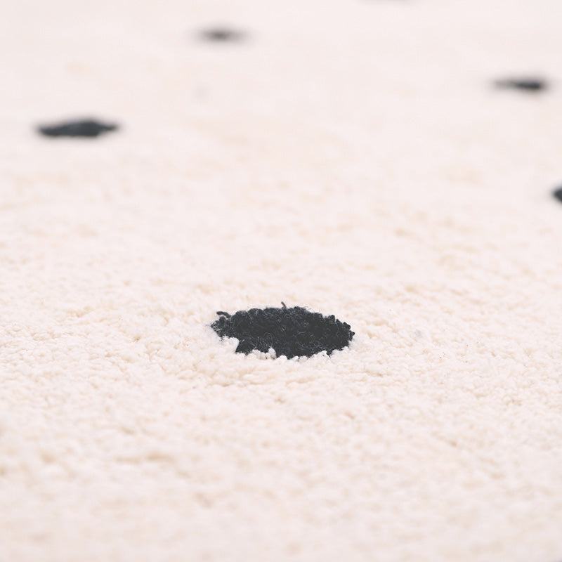 NÜMI Black children's rug with dots